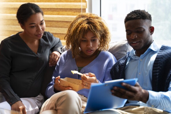 people planning in a sofa